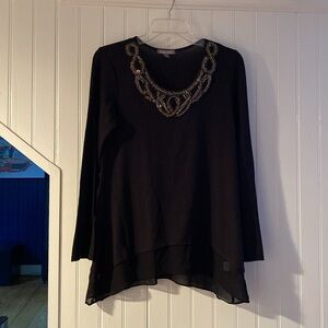 Blouse sweater with neckline beading. Beads are metallic.